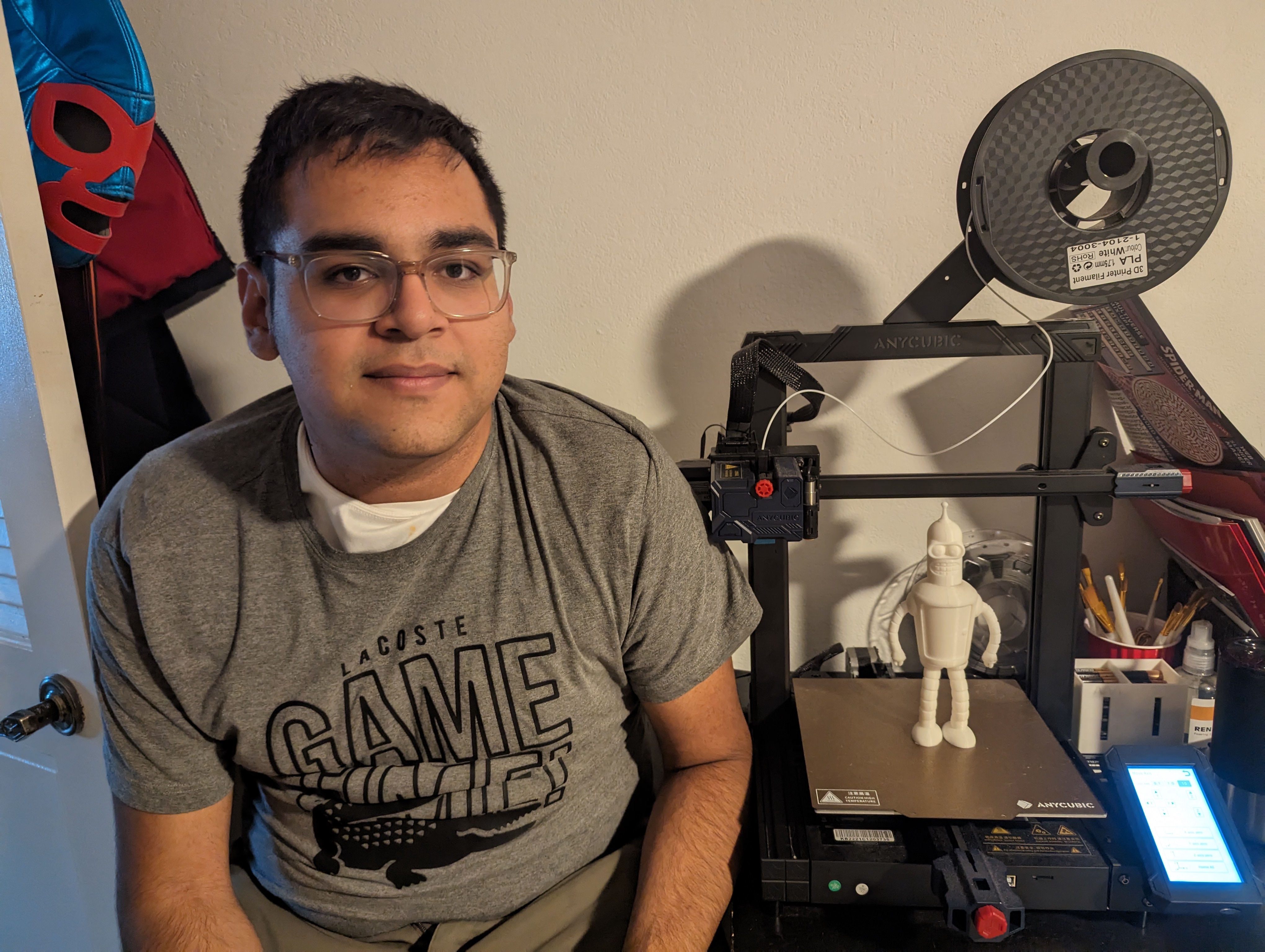 Rodrigo who is next to a 3d printed version of bender.